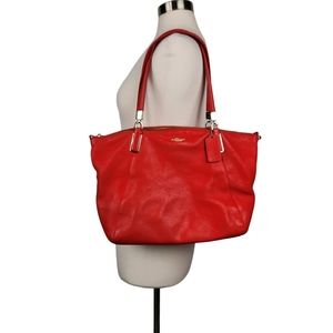 Coach Kelsey Red-Orange Pebbled Leather Shoulder Bag.